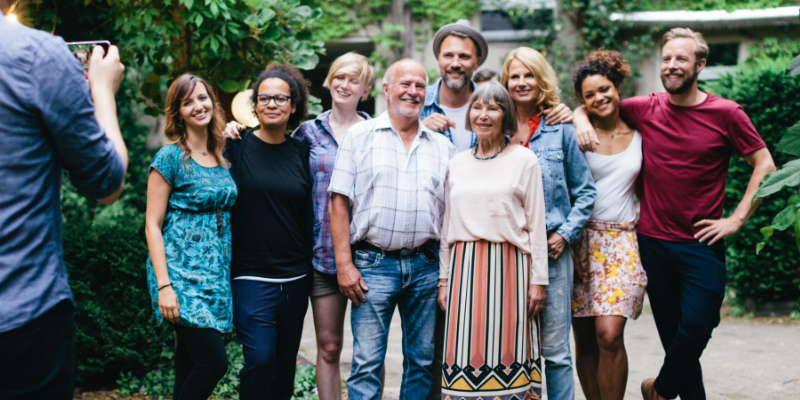 A group of people standing next to each other