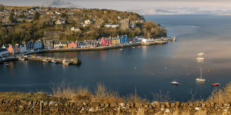 A body of water with a bunch of boats in it.