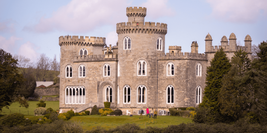 A large castle like building surrounded by trees