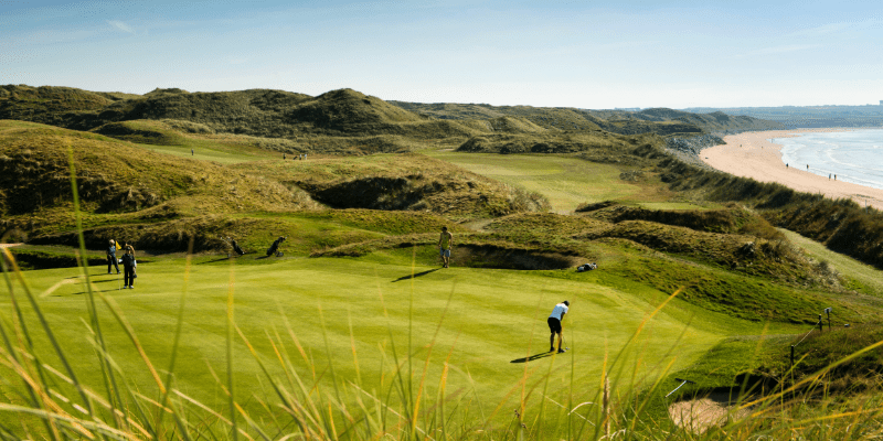 Landscape of Golf Field with people playing