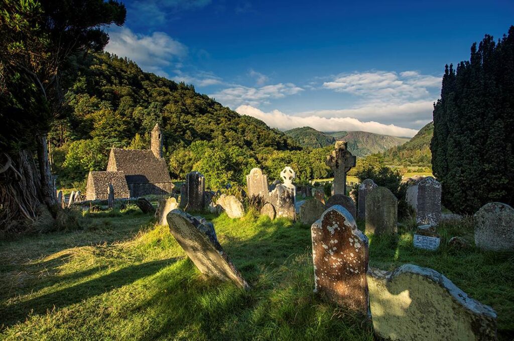A cemetery with a mountain in the background