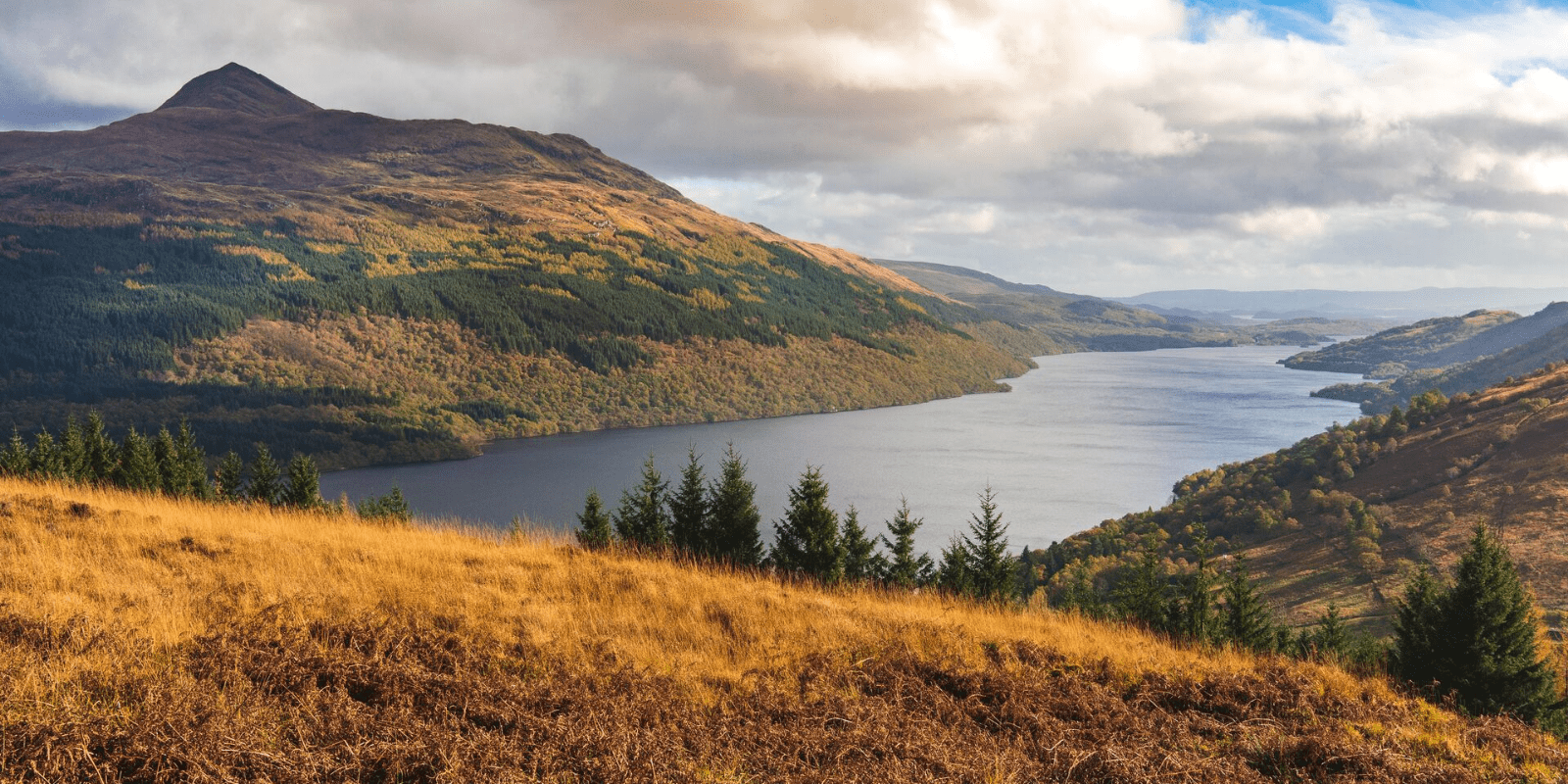 A large body of water surrounded by mountains