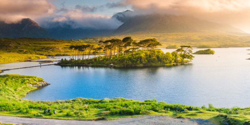 A scenic view of a lake surrounded by mountains