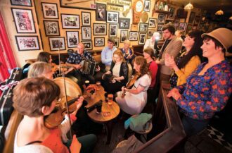 Crowd at Galway pub enjoying Irish Music