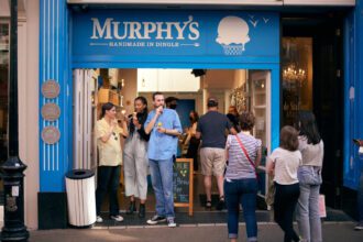 People eating ice cream in front of Murphy’s ice cream shop
