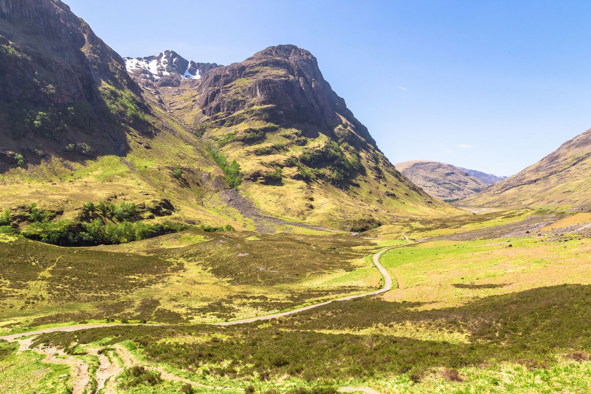 A path leading through mountains in Scotland 