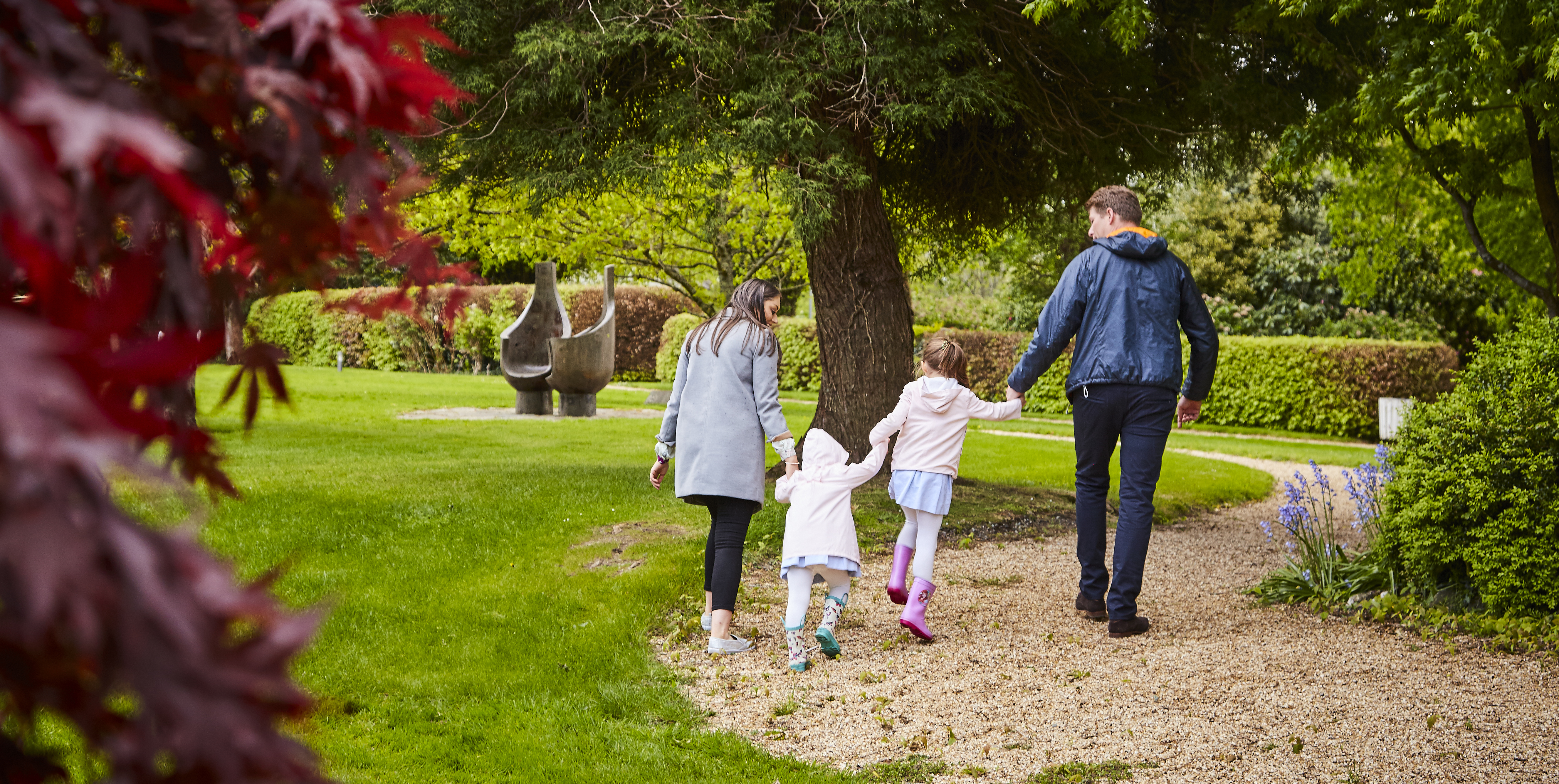 A family in the gardnes of the Great Southern Killarney in Ireland