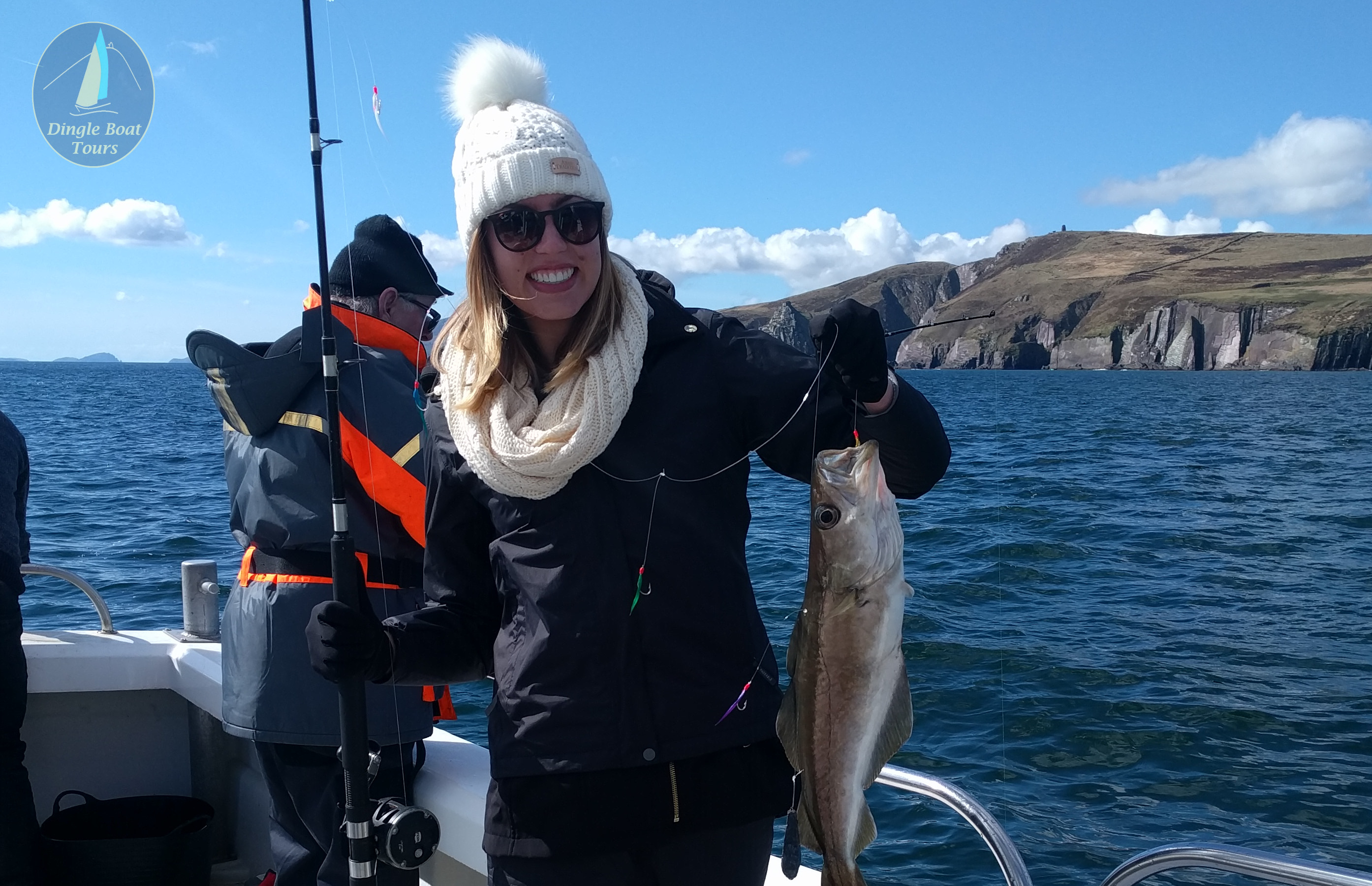 Lady with a fish she caught on the Dingle fishing trip