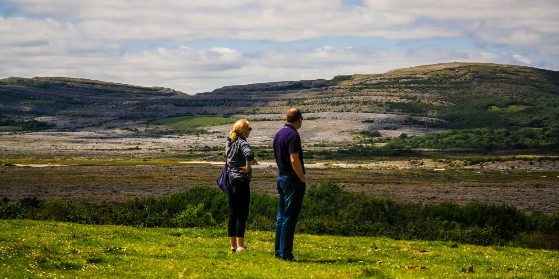 Couple looking over Burren farm