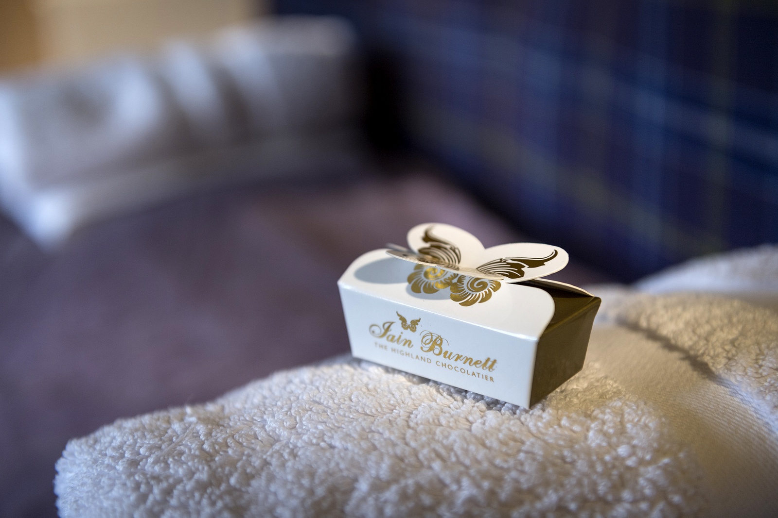 Elegant box of chocolate on the towel