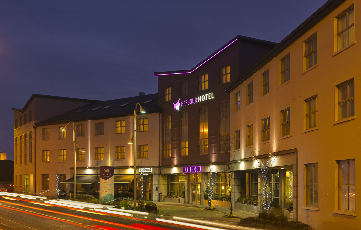 Exterior of Harbour Hotel in Galway by night