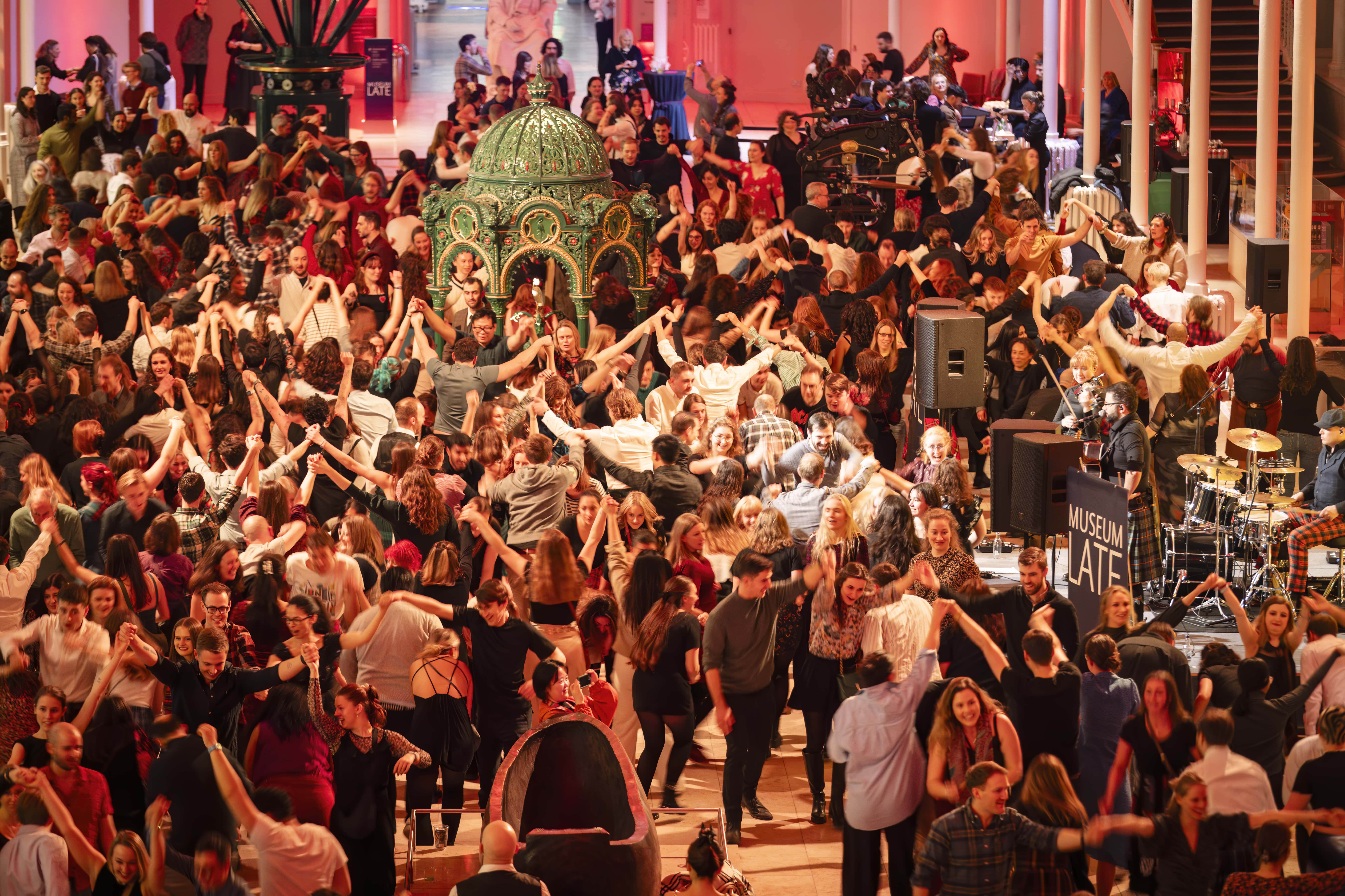 People dancing and celebrating Burns Night at The National Museum of Scotland