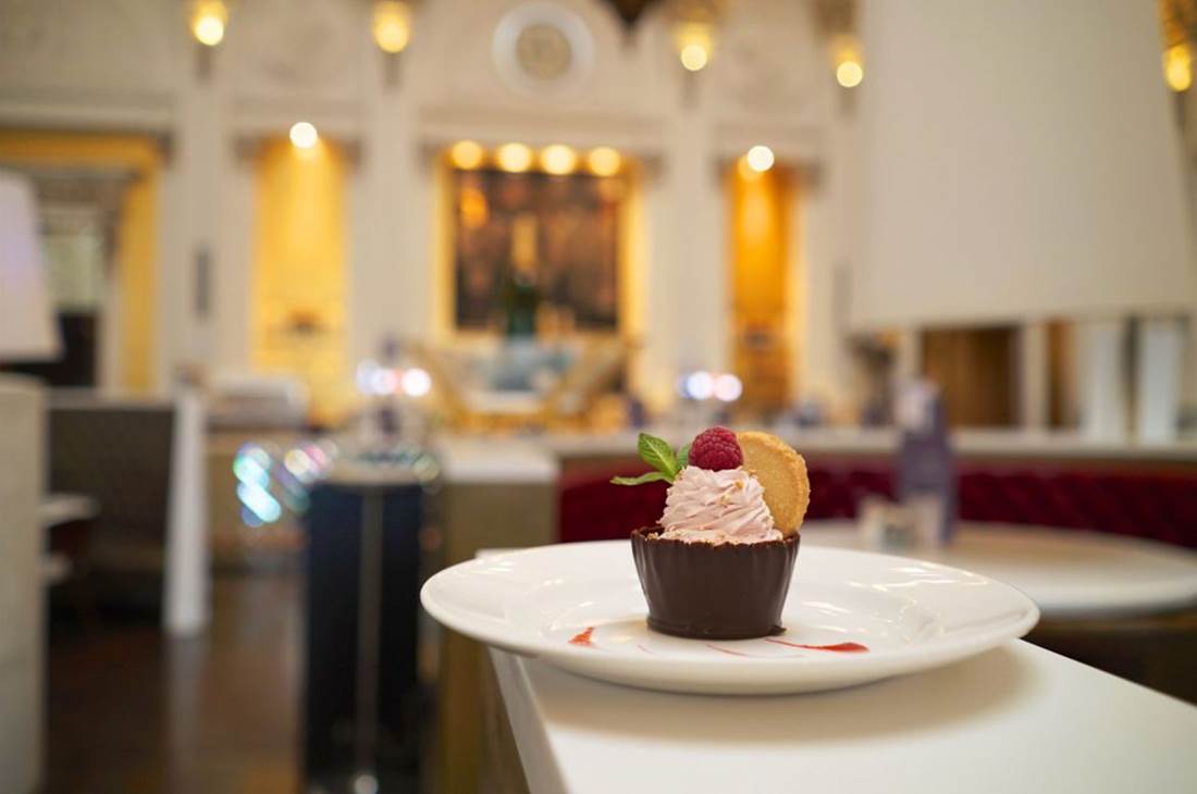 A small dessert on a white plate on a table 