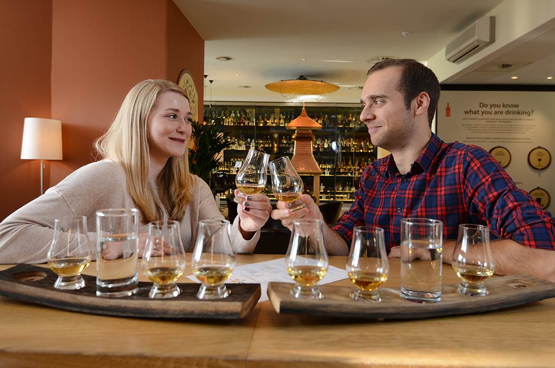 Couple Drinking Whisky at the Scotch Experience in Edinburgh, Scotland