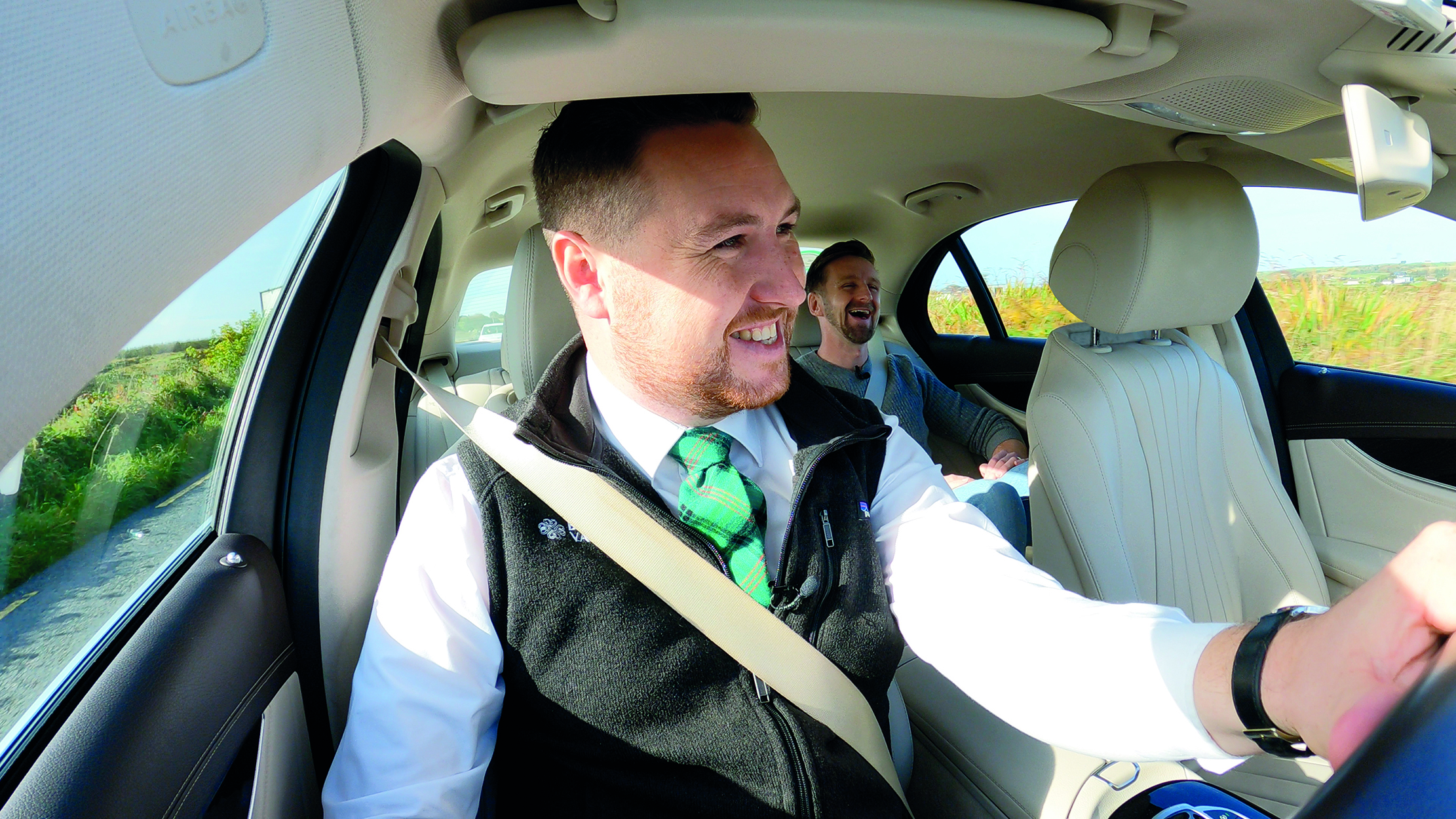 A Private Chauffeur shares stories about the places being visited with a guest 