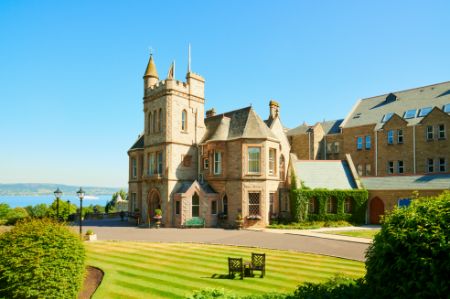 A large building with a clock tower on top of it