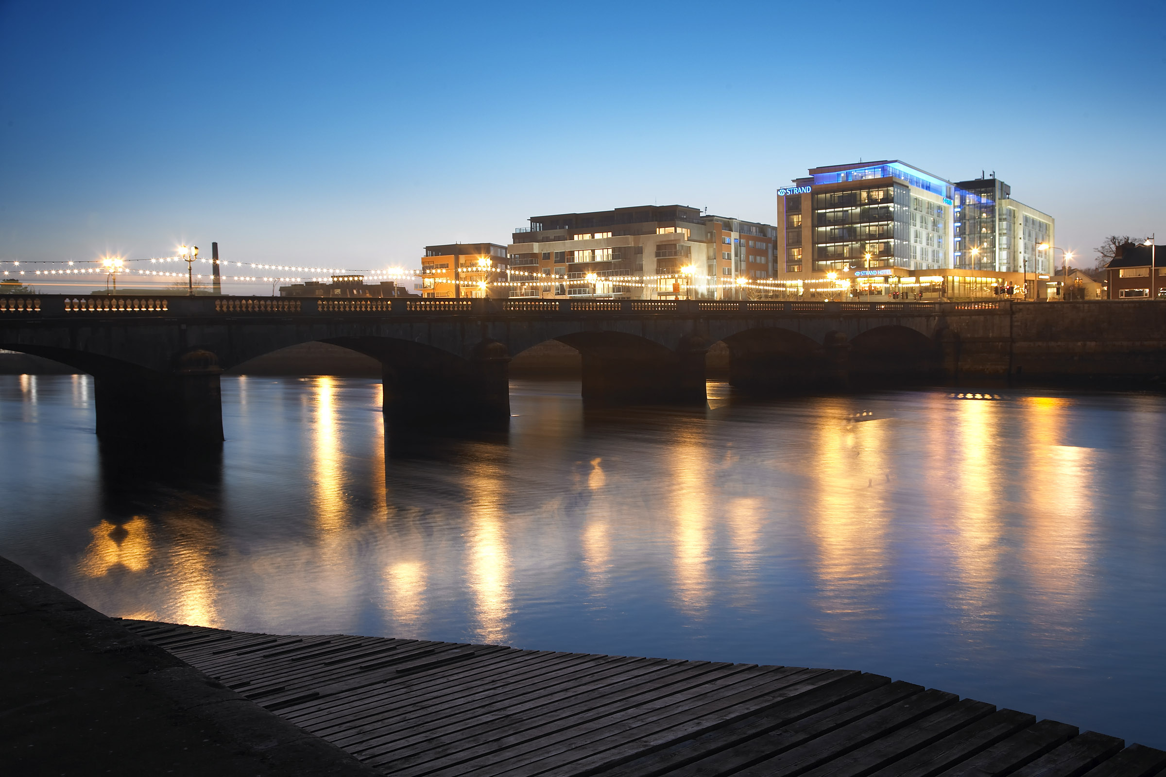 Exterior of Limerick Strand Hotel by night