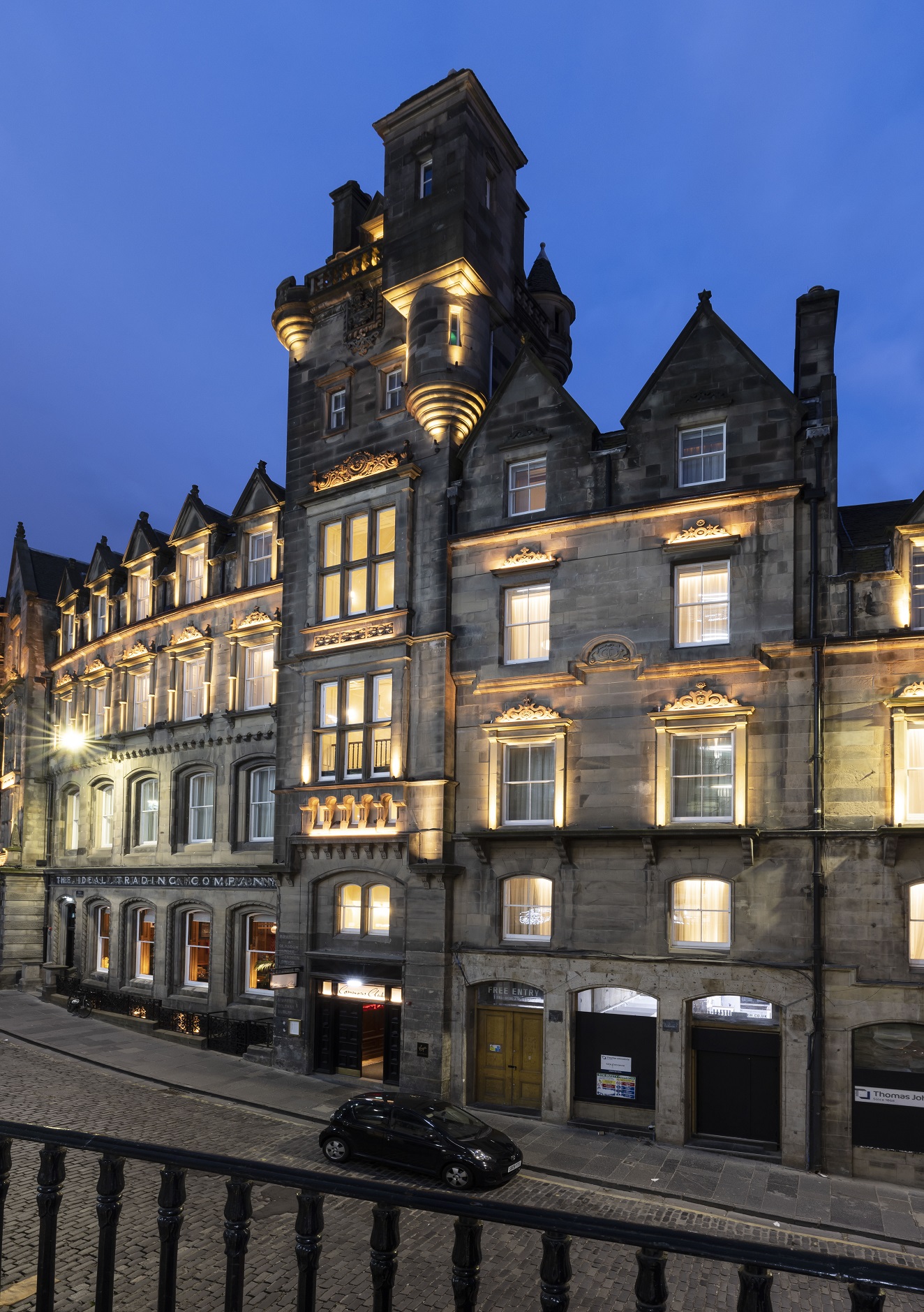A very tall building with a clock tower on top of it