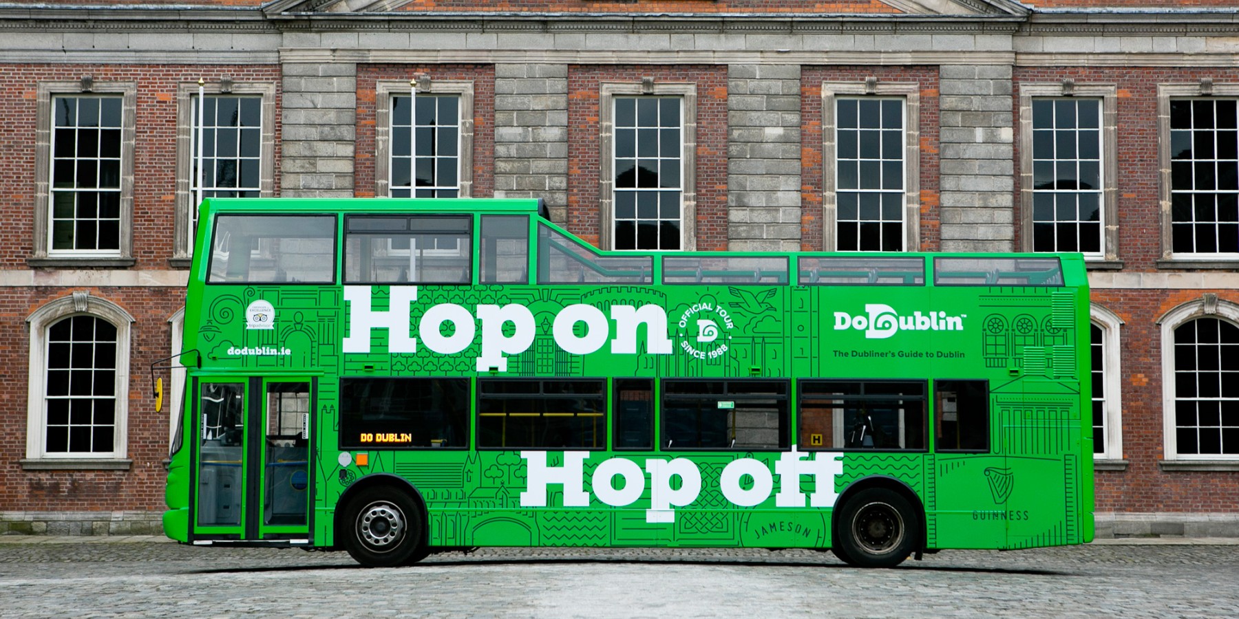 Hop on hop off green bus in Dublin