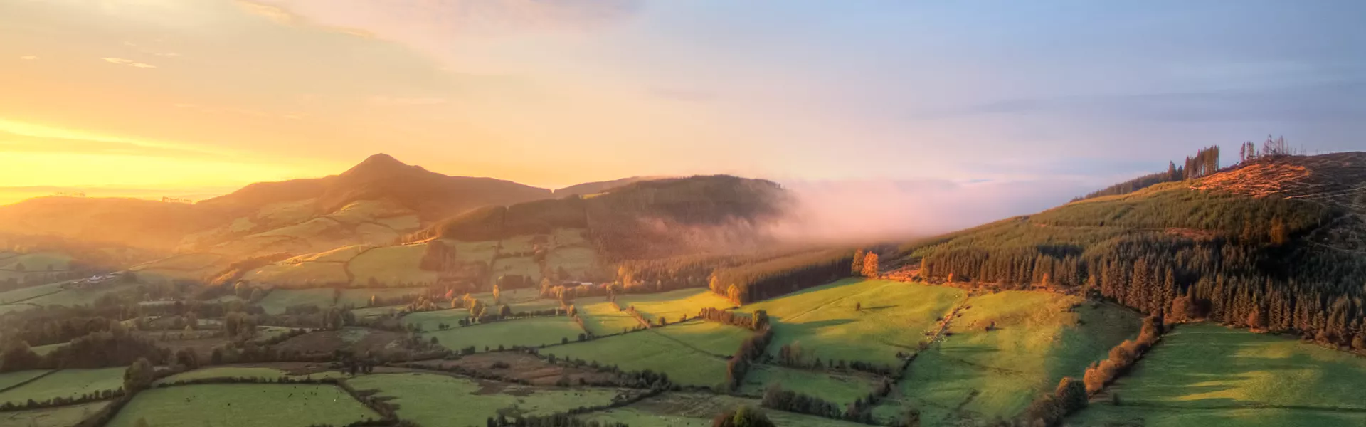 The sun rises over Tipperary Mountain in Ireland