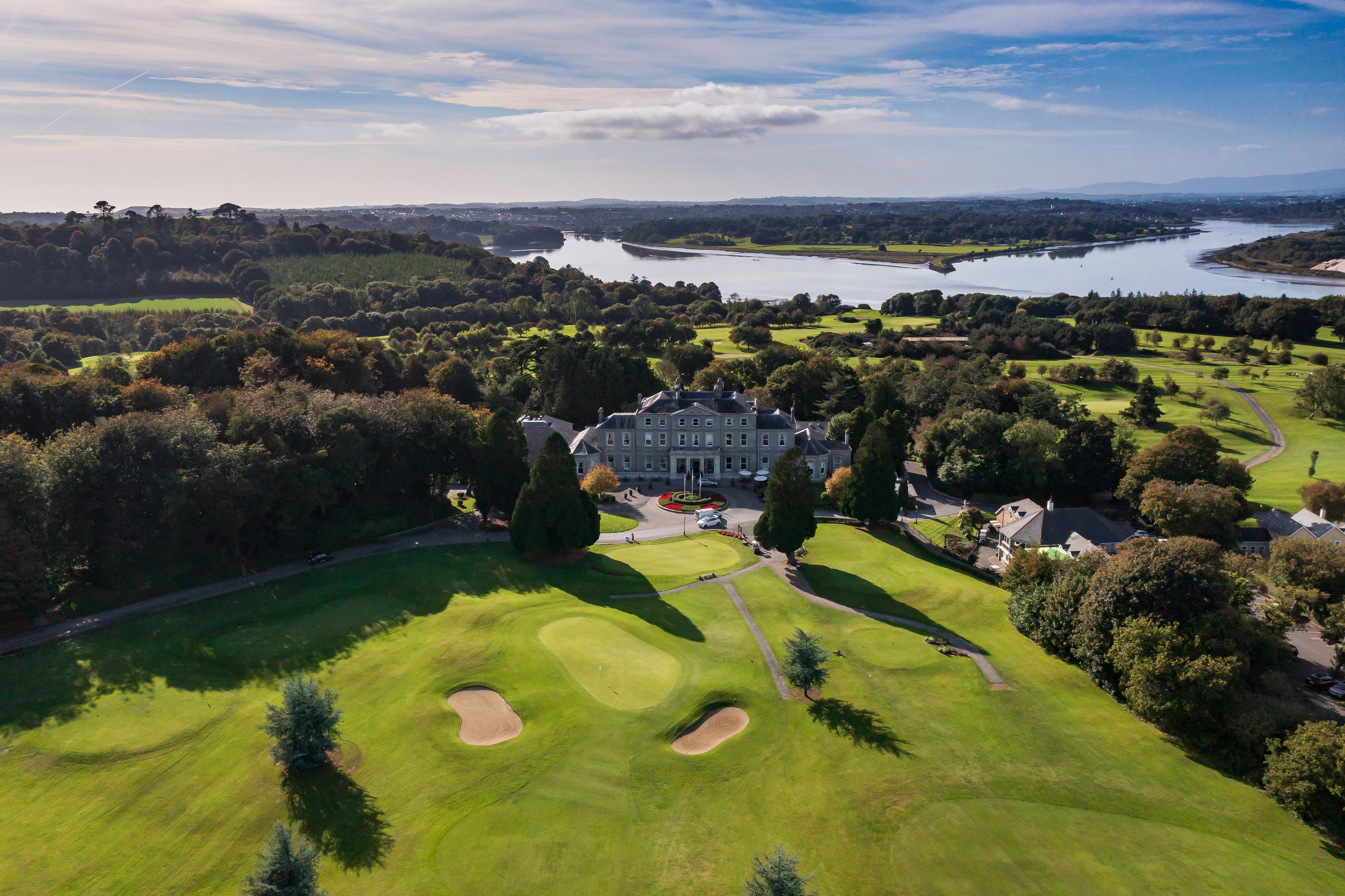 Faithlegg House in Ireland with a river in the background