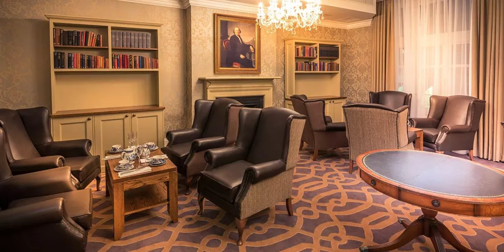 A living room filled with furniture and a chandelier