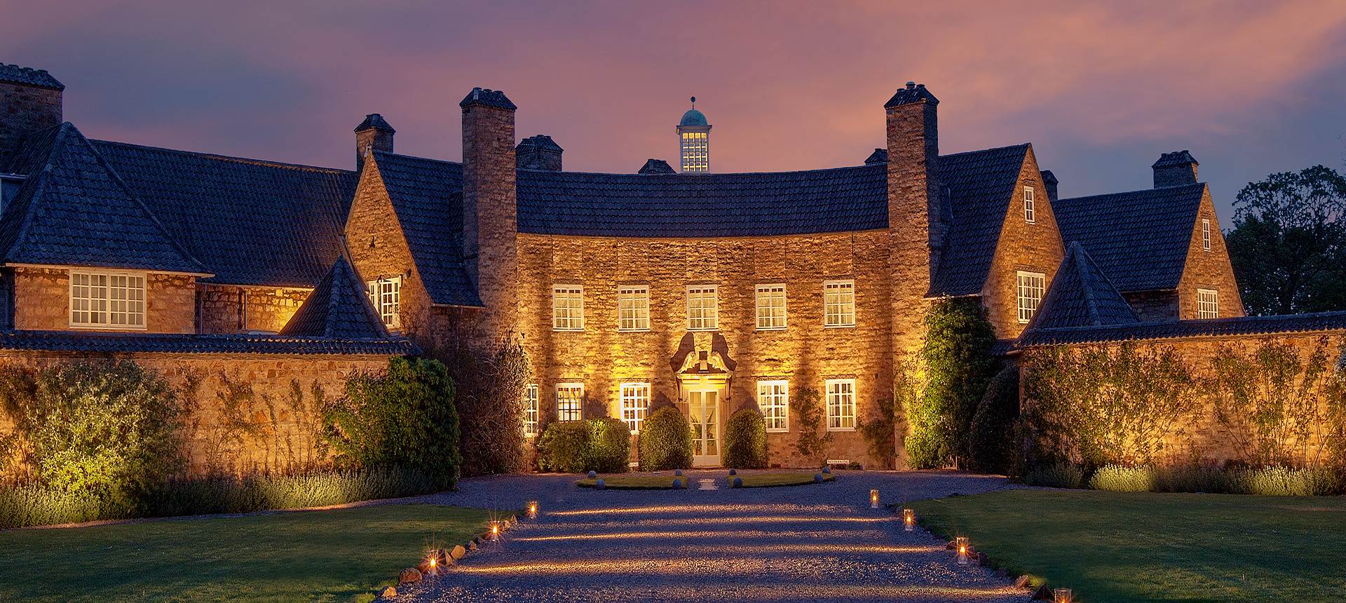 Exterior of Greywalls Hotel & Chez Roux in Scotland by night