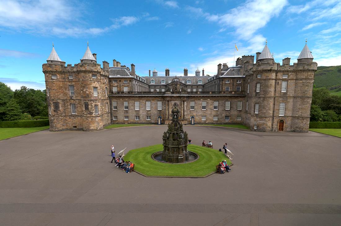 Holyrood Palace with a fountain in front of it, Edinbourgh, Scotland