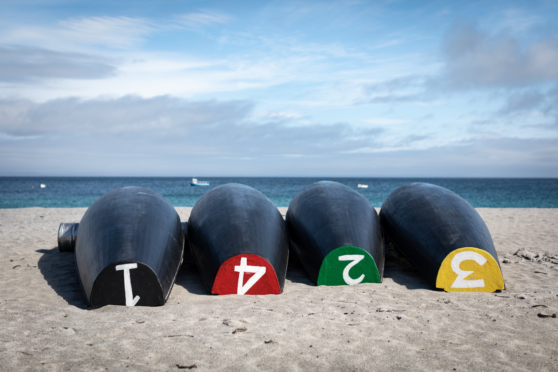 Boats on Inis Mor numbered one to four