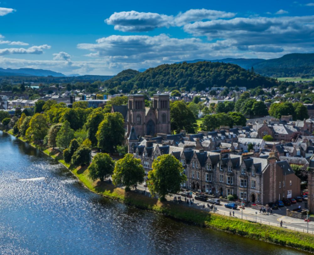 Cathedral alongside the blue glistening river