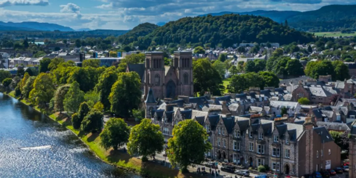 Cathedral alongside the blue glistening river