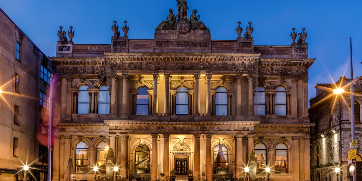 Exterior of The Merchant Hotel by night in Belfast, Northern Ireland
