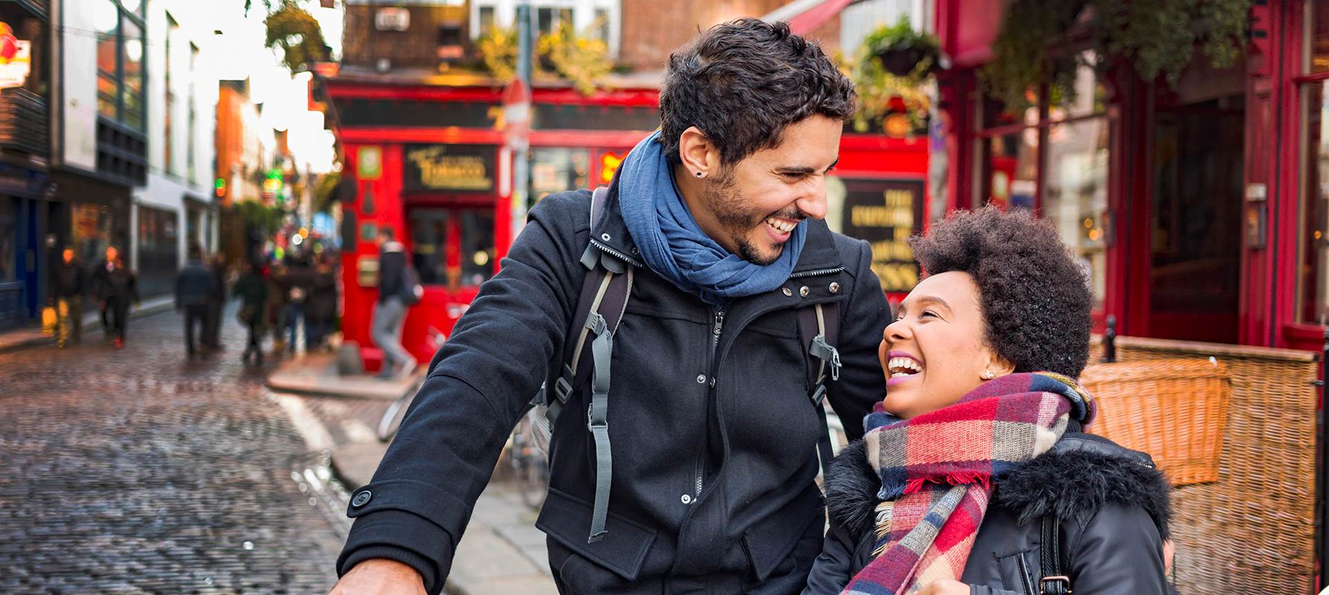 A couple walking down a street