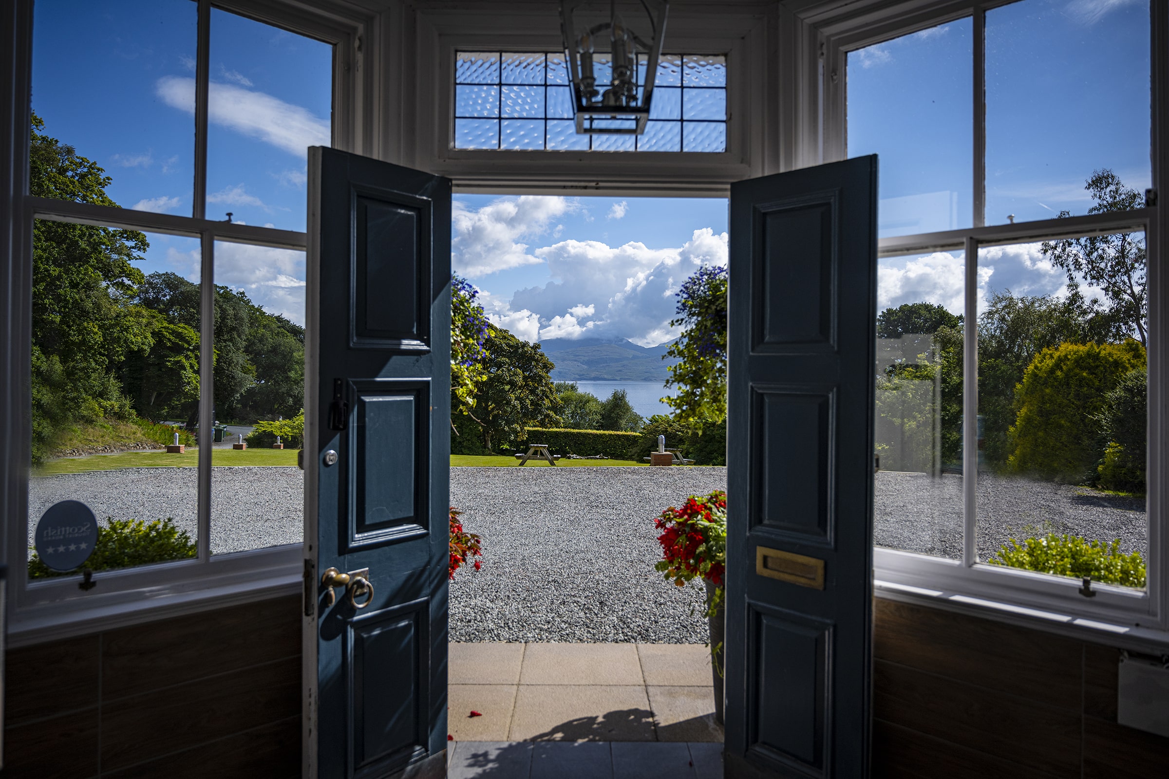 Entrance of Duisdale Hotel with lake view in Scotland