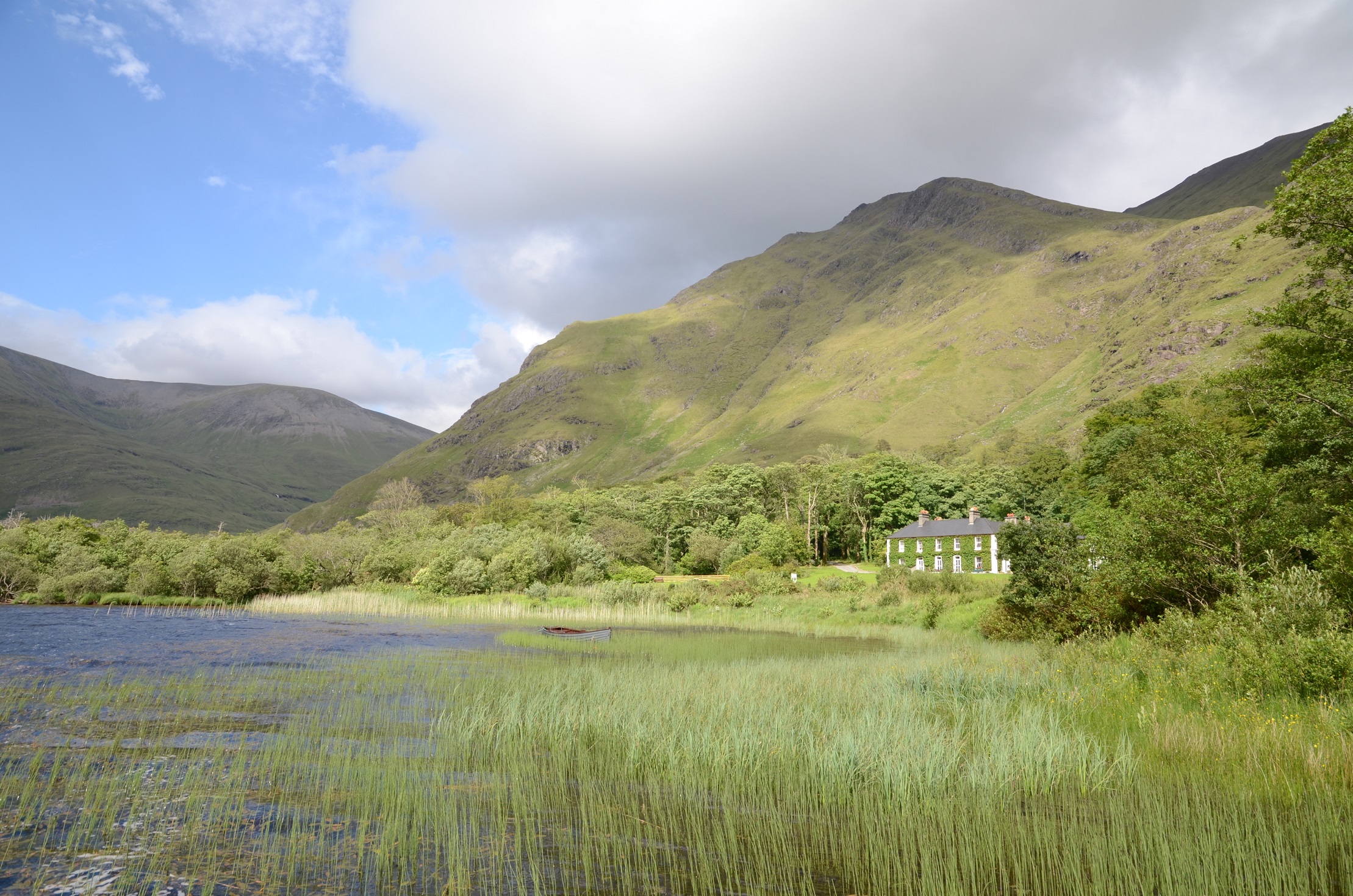 Delphi Lodge in Galway, Ireland surrounded by hills and lake