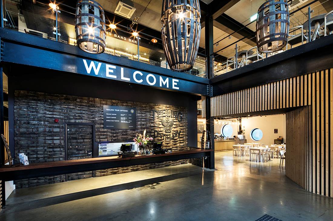 A large open space with a welcome sign on the wall 