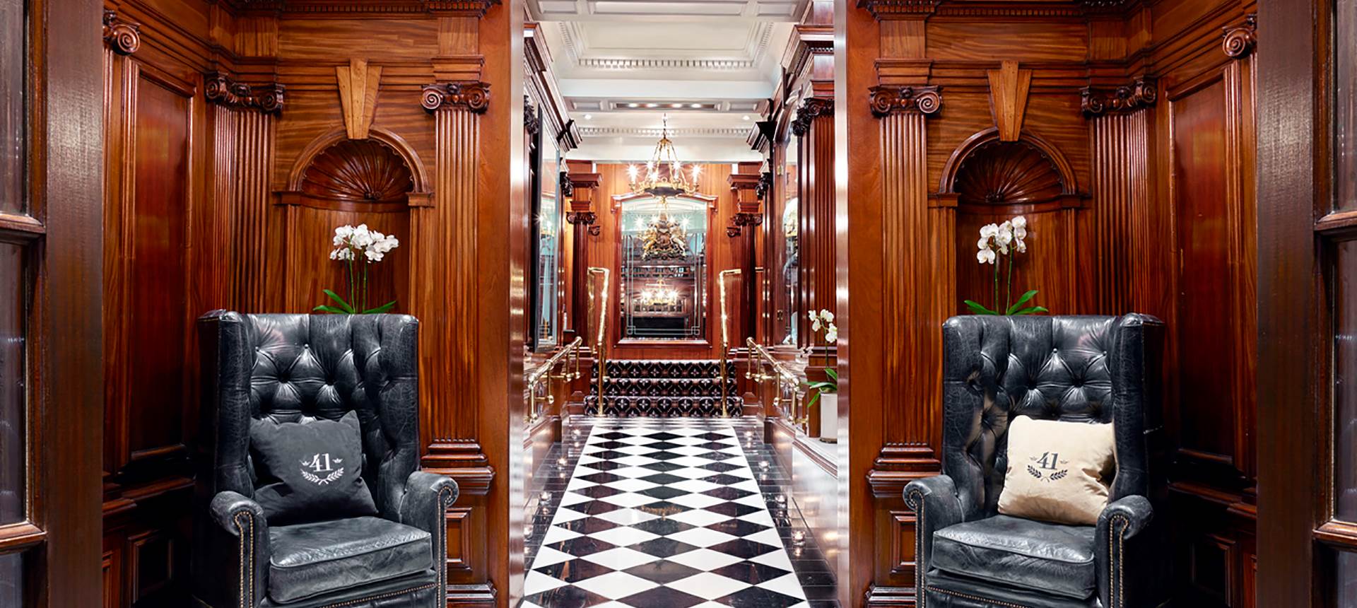 Lobby with two black armchairs in Hotel 41 in London