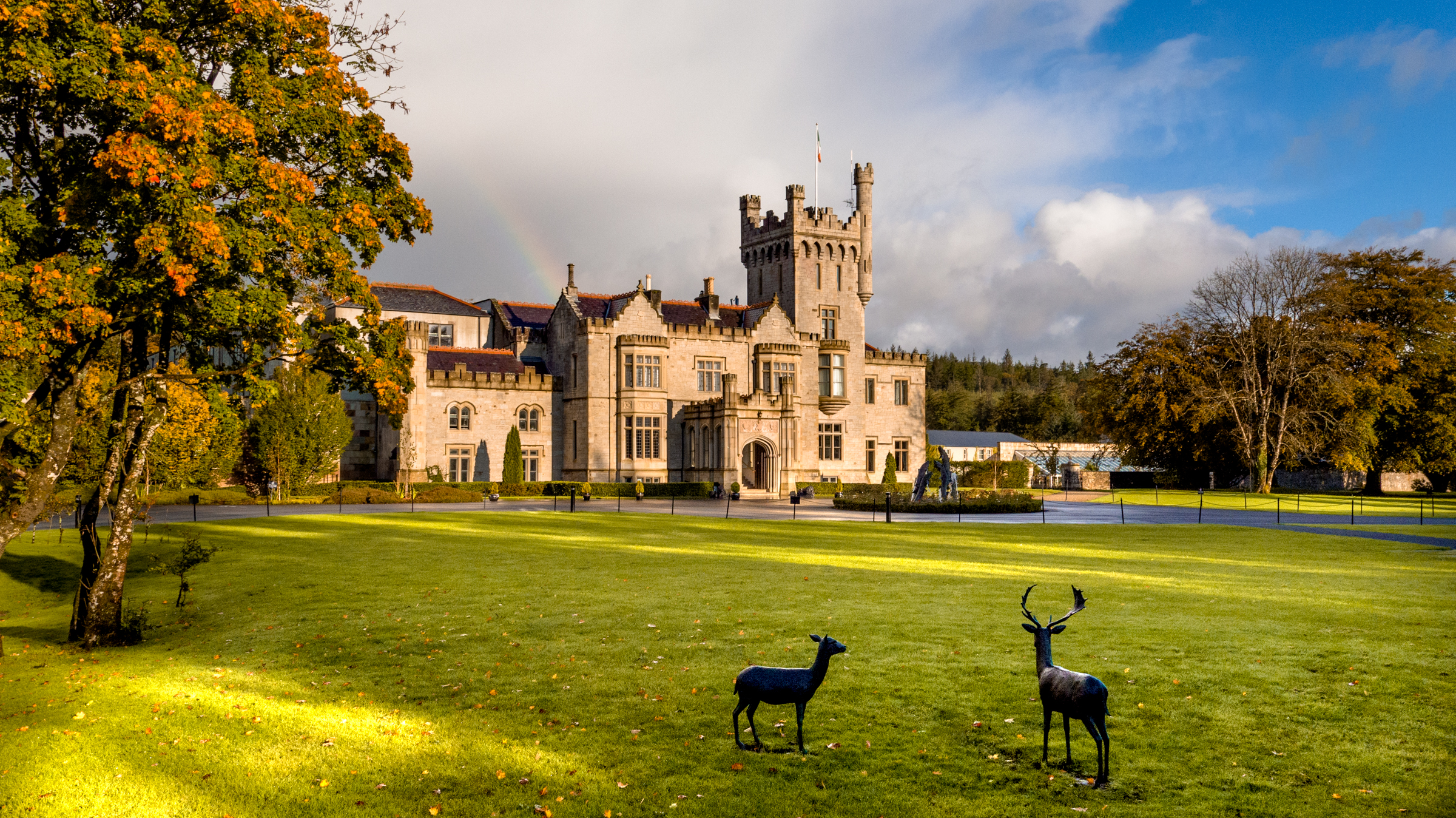 Front of lough eske, grey cloufs and a rainbow