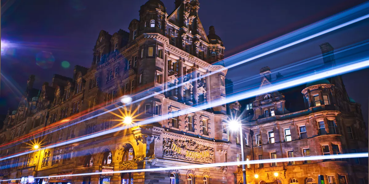 Exterior of The Scotsman Hotel by night