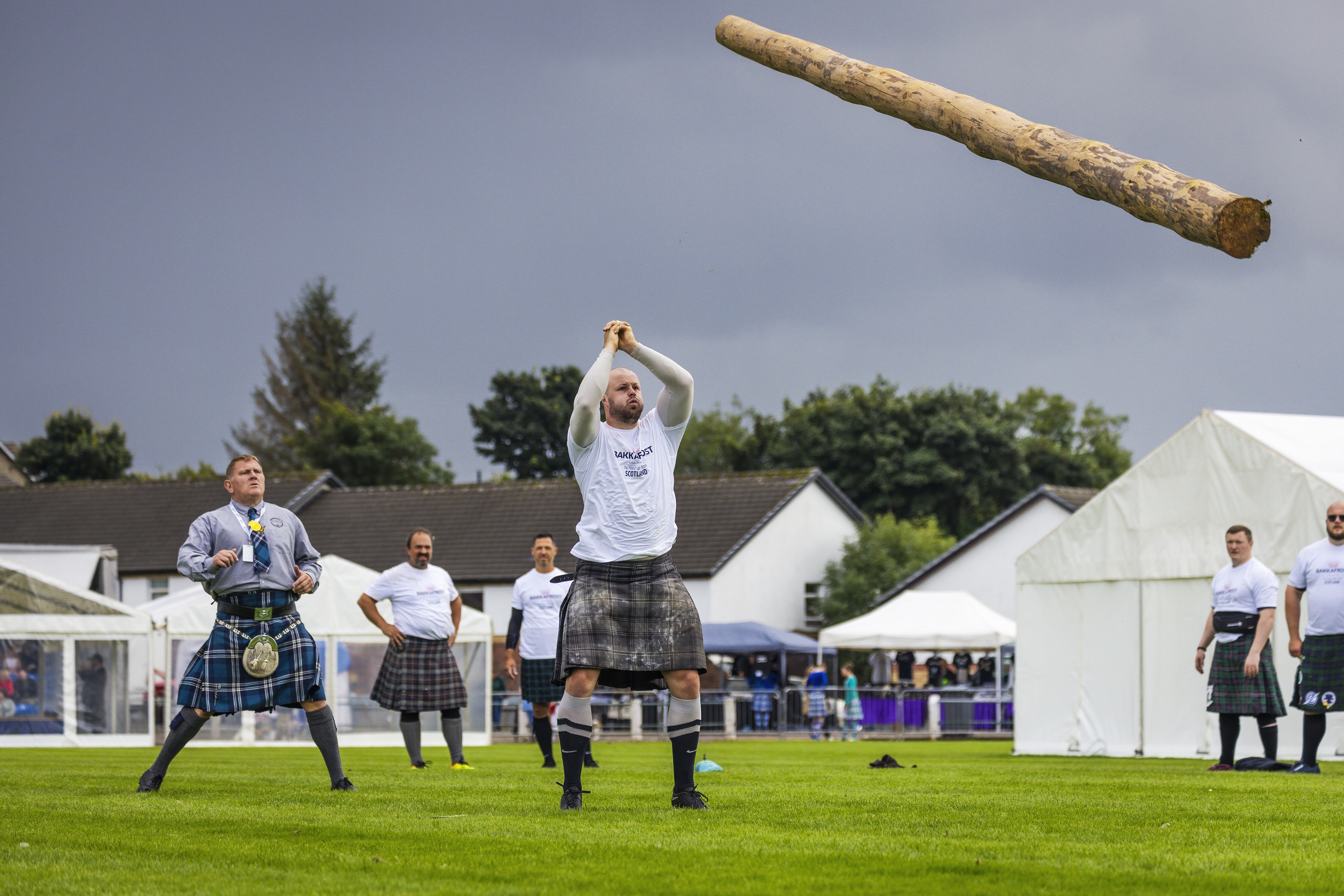 Caber toss contest during the Pitlochry Highland games