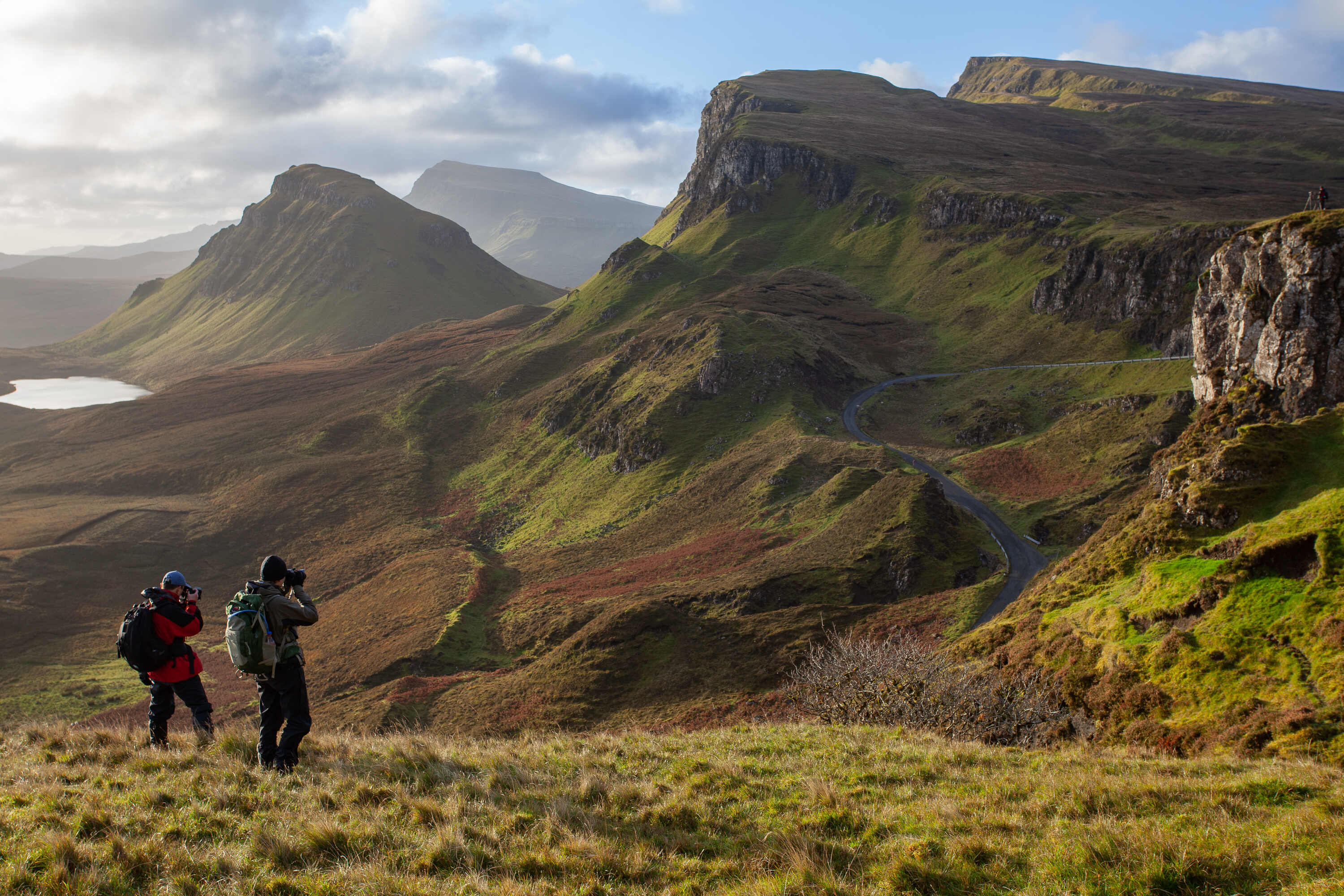 tourists taking photos on a hike