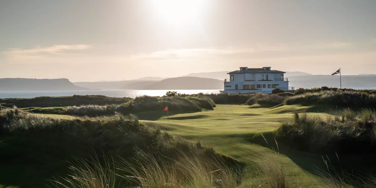 A house on a golf course near the ocean
