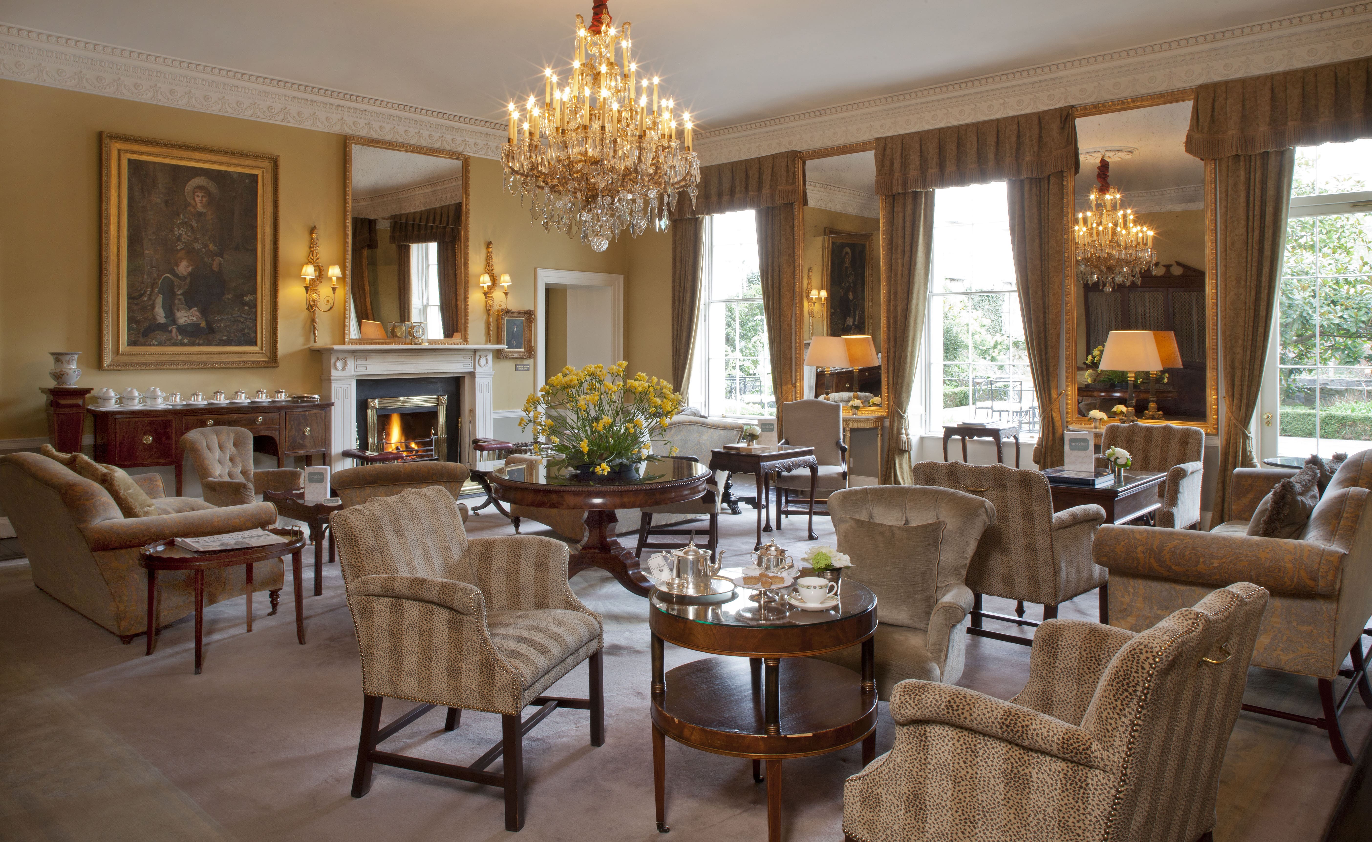 Drawing room with lots of chairs and tables in the Merrion Hotel in Dublin