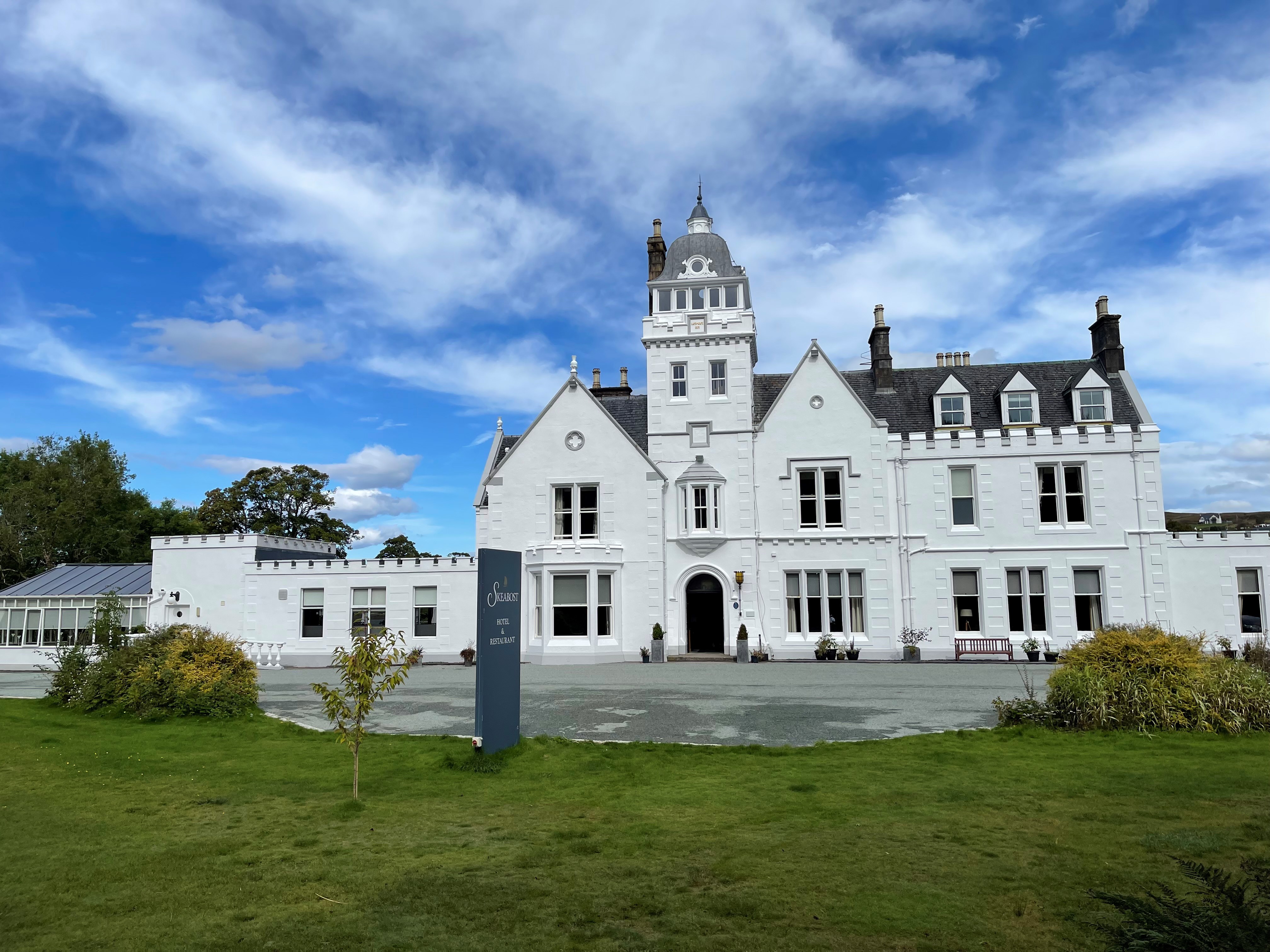 A large white building with a clock tower